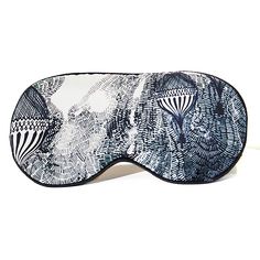 This black and white, illustrated silk sleep mask helps you get restful sleep in style while travelling, at home or on the beach. Indulge in a restful and luxurious bedtime routine with our air balloon eye mask, crafted from soft silk satin and featuring intricate artwork. This silk sleep mask pampers your skin and provides the ultimate sleep sanctuary with its calming and soothing effects, effortlessly transporting you to a restful sleep. Personalize your comfort level with the adjustable elast Eye Rest, Balloons In The Sky, Mask Black And White, Cute Sleep Mask, Adventurous Travel, Intricate Artwork, Satin Hands, Silk Sleep Mask, Sleep Sanctuary