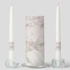 Discover the elegant fusion of Candle Abstract Marble, a collection that harmoniously blends luxury and sophistication. These unique candles boast a modern design and a timeless appeal. Elevate your space with a touch of glamour and ambiance. #candlelover #marbledecor #luxurycandles #homedecor #candleobsessed #modernhome #sophisticateddesign #decorinspiration #candleaddict #giftideas Unity Candle Sets, Marble Decor, Unity Candle, Unique Candles, Marble Stone, Luxury Candles, Marble Stones, Candle Set, Decor Inspiration