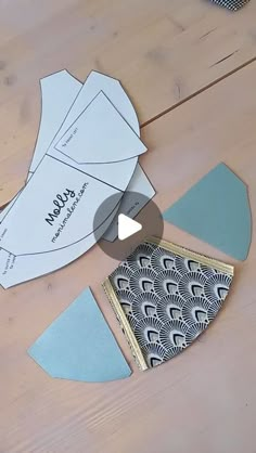 the paper is cut out to make an origami bird