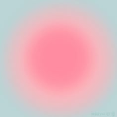 a pink circle is shown in the middle of a light blue background with an orange center