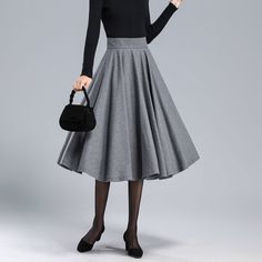 "DETAIL * 30% wool, 30% fiber, 40% polyester * fully satiny liner * Two side pockets * Back zipper closure * Plus size full skirt * Pleated skirt * Perfect for Winter, autumn * Lean More about the items From the FAQs on the page bottom * The model is 170cm (5′ 7″) tall with a 80cm (31.5\") bust, 66cm (26\") waist. She is wearing the grey wool skirt in size XS. CUSTOM MADE SERVICE If you * Change other color * Can't find your size in our size Chart * Change the Style * Change the length * Your He Winter Pleated Solid Color Skirt, Winter Solid Color Pleated Skirt, Fitted Skirt For Office In Winter, Fitted Office Skirt For Winter, Fitted Winter Skirt For Office, Elegant Full Skirt Bottoms For Fall, Elegant Solid Mini Skirt For Fall, Fitted Winter Pleated Lined Skirt, Fitted Lined Pleated Winter Skirt