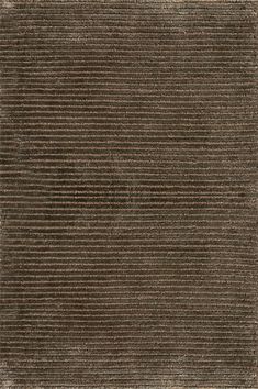 a brown and white rug with fringes on it