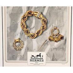 This is a rare 1948 Mid-Century French Hermès jewelry advertisement print that originally appeared in a French periodical. This is NOT a recent reproduction print. The image features an eloquent collection of Hermès gold and diamond jewelry designs shown on a background of an Hermès  scarf.  (Zoom in to see the subtle designs of the scarf.)  This is an image in classic Hermès  style.  Vintage Hermès  advertisement prints have become increasingly more difficult to find with the passage of time. P Jewelry Advertisement, Hermes Style, Hermes Jewelry, Jewelry Ads, Vintage Hermes, Diamond Jewelry Designs, Hermes Paris, Jewelry Designers, Classy Jewelry