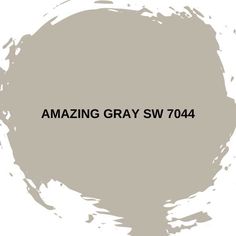 the words amazing gray sw 704 are painted in black on a light grey background