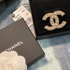 Beautiful Chanel Pearl And Crystal Cc Brooch! Pristine And In Original Chanel Box And Packaging! Chanel Pearl Brooch, Luxury White Brooch For Gift, Luxury White Brooches For Gifts, Luxury White Brooches As Gift, Designer White Brooches For Formal Occasions, Designer White Brooches For Wedding, Designer White Wedding Brooches, Cc Brooch, Chanel Pearl