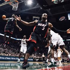 two basketball players in action on the court