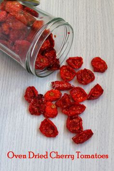 dried red cherry tomatoes in a glass jar