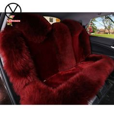 the interior of a car with red fur