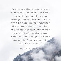 a mountain with clouds and a quote from haru muhami on the top