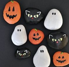 halloween rock magnets with black cats, pumpkins and jack - o'- lanterns