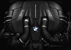 the bmw engine is shown in this black and white photo