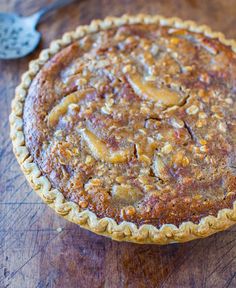 a pie sitting on top of a wooden table