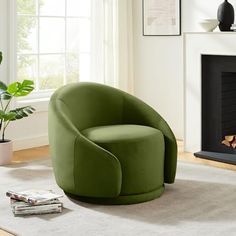 a green chair sitting in front of a fireplace next to a potted plant on top of a rug