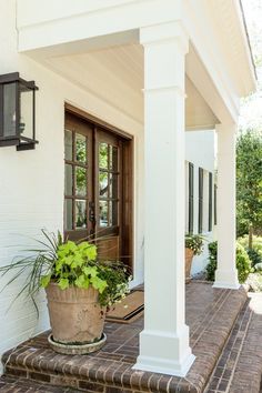 entryway with custom columns Outdoor Wood Columns Porch Posts, Craftsman Posts Columns, Update Porch Posts, Column Design Exterior Entrance, Outdoor Patio Column Ideas, Exterior Posts Columns, Front House Pillars, Thick Porch Columns, Cottage Porch Columns