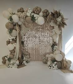 a photo frame with balloons and flowers on the front is decorated in gold, white and silver