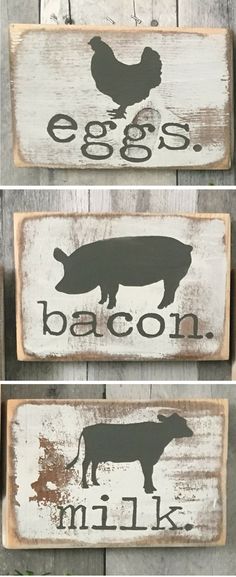 three wooden signs that say eggs, bacon, and milk with farm animals on them