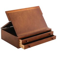 an open wooden box with two drawers