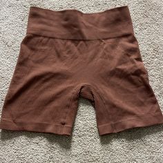 Brown Biker Shorts Size Medium. Never Worn Sporty Brown Biker Shorts, Brown Stretch Sports Shorts, Brown Stretch Shorts For Sports, Stretch Brown Sports Shorts, Brown Fitted Sporty Shorts, Sporty Brown Fitted Shorts, Brown Sports Shorts, Sporty Stretch Brown Biker Shorts, Brown Stretch Workout Shorts