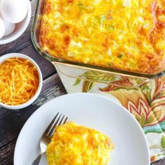 an egg casserole on a plate next to other dishes