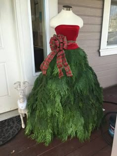 a dress made out of grass on the porch