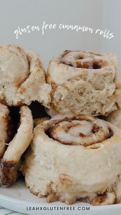 cinnamon rolls on a white plate with the words glazen - free cinnamon rolls