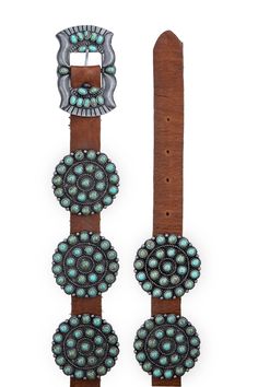 silver-tone concho with faux turquoise stone buckle closure buckle dimensions: 1 7/8"H x 3"W silver-tone cluster conchos with faux turquoise stones concho dimensions: 2 1/8" diameter; 8 conchos total leather 8-10 week delivery Size Medium measures 32" along center of belt from fold at buckle end to center hole. Each size grades 2". Turquoise Belt, Church Fits, Double D Ranch, Concho Belt, Turquoise Stones, High Heel Boots, Lifestyle Brand, Turquoise Stone, Belts