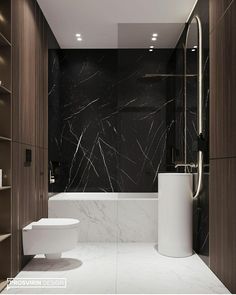 a modern bathroom with black and white marble walls, flooring, and built - in shelving