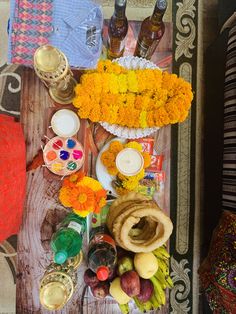 a table topped with lots of different types of food and drinks on top of it