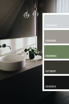 the bathroom is painted in shades of gray and green