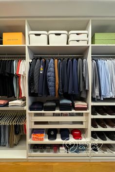 an organized closet with clothes and shoes