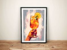 a painting of a hand holding a wine glass with an orange slice in it on a wooden table