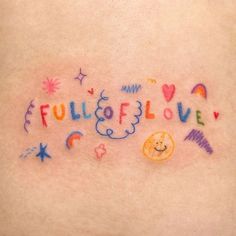 the back of a woman's stomach with colorful writing on it that says, full of love