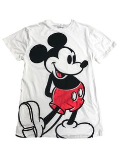 a mickey mouse t - shirt that is white with black and red on the front