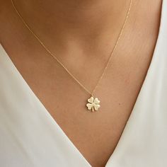 "Solid Gold Clover Pendant, Gold Clover Necklace, Gold Shamrock Charm, Four Leaf Clover, Gold Clover Charm, Gold Shamrock Pendant, Gold Clover Jewelry Our product weighs 2.35 gr and the chain length is 42 cm. All of our products has the stamp \"585\" on them. (which states that this is real gold) There may be +/- 0.15 change in gram information due to production. Quality control has been done. Our products are Anti Allergic. Your orders are shipped with a gift package. This special gift box is s