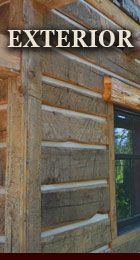 an exterior view of a log cabin with the words, interior on it's side