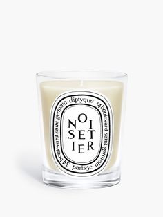 a candle that is sitting in front of a white background with the words, no setier on it