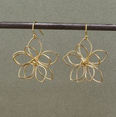 Gold Wire Wrapped Flowers on gold filled ear wires - Gold plated brass flowers - Flowers measure 32mm   - Gold Filled Wires - Lightweight and Comfortable Here is the link to the identical earrings in silver instead of bronze: https://mosaicsunstudio.etsy.com/listing/1648730710 Wire Wrapped Flower Earrings, Cute Wire Earrings, Flower Wire Earrings, Butterfly Wire Earrings, Gold Wire Earrings, Gold Wire Jewelry, Wire Flower Earrings, Wire Wrapped Flower, Wrapped Flowers