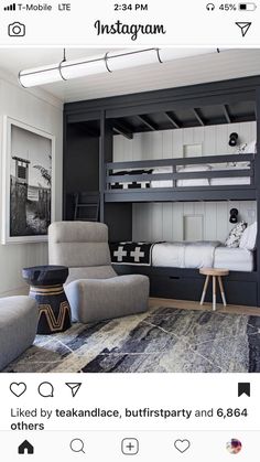 a bedroom with bunk beds and chairs in it