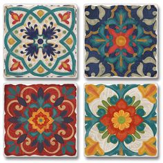 four square tiles with colorful designs on them