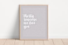 a framed poster with the words thirty years we love you in white and grey on it