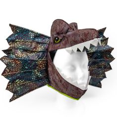 an animal mask made out of paper with a large mouth and sharp fangs on it's face