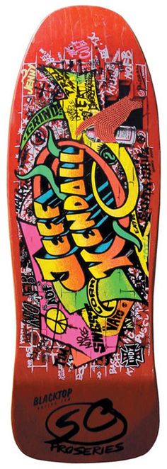 an orange skateboard with graffiti on it