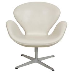 an egg chair with white leather upholstered seat and chrome base, viewed from the front