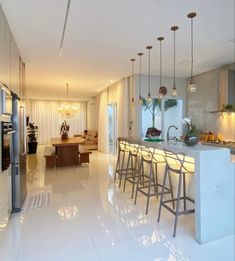 the kitchen is clean and ready to be used as a dining room or living room