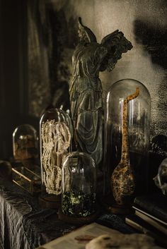 an assortment of glass objects on a table