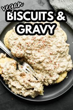 vegan biscuits and gravy on a black plate with a fork in it