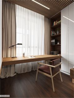 a wooden desk sitting in front of a window next to a book shelf filled with books