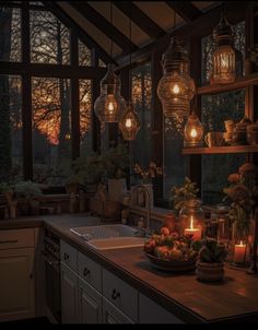 a kitchen filled with lots of hanging lights