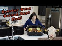 a woman standing next to a cow with food in it's mouth and the words roaster oven corned beef meal