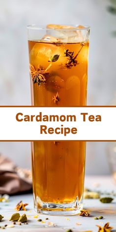 a glass filled with tea sitting on top of a table